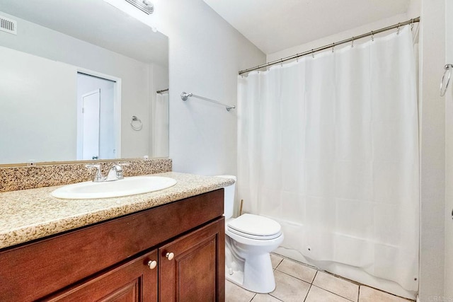 full bath with vanity, tile patterned floors, toilet, and visible vents