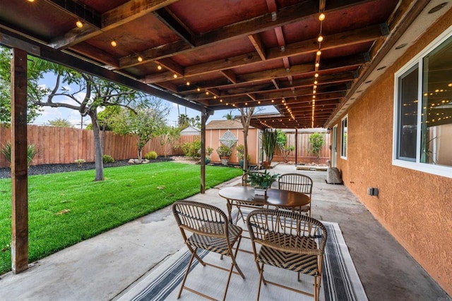 view of patio featuring a fenced backyard, a storage shed, and an outdoor structure