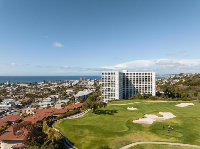 view of home's community with a city view, golf course view, and a water view