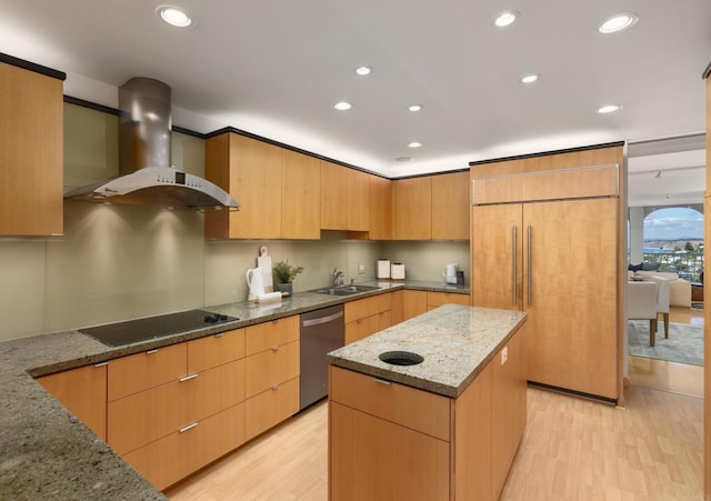 kitchen with paneled refrigerator, stainless steel dishwasher, black electric stovetop, wall chimney exhaust hood, and modern cabinets