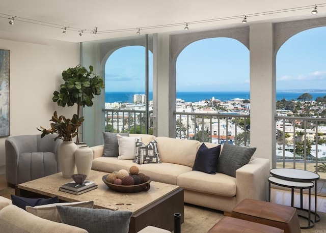 1001 Genter St Unit 9Ab, La Jolla, CA 92037 - living room with a water view, rail lighting, and healthy amount of natural light