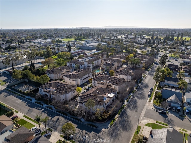 birds eye view of property with a residential view