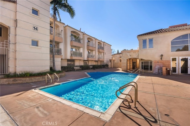 pool with a patio