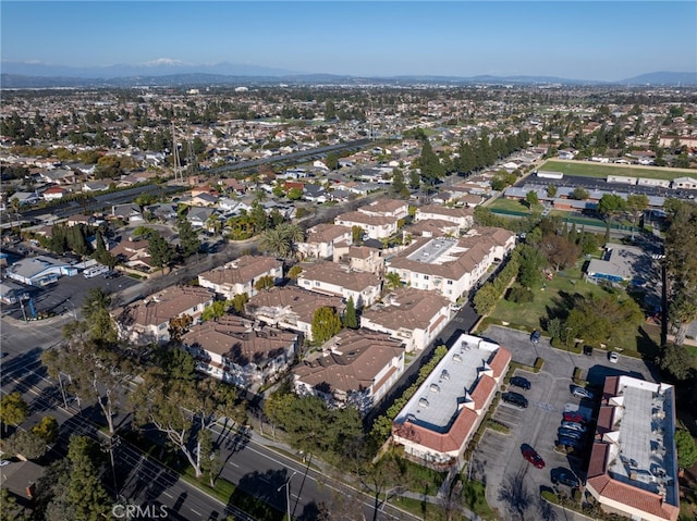 birds eye view of property with a residential view