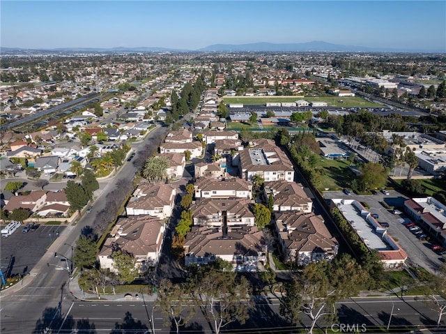 aerial view featuring a mountain view and a residential view