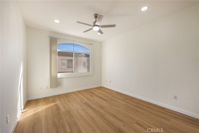 unfurnished room featuring recessed lighting, baseboards, wood finished floors, and ceiling fan