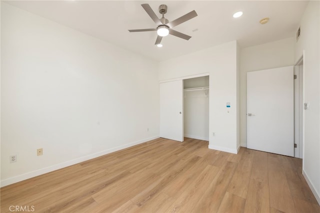 unfurnished bedroom featuring visible vents, recessed lighting, a closet, light wood-style floors, and baseboards