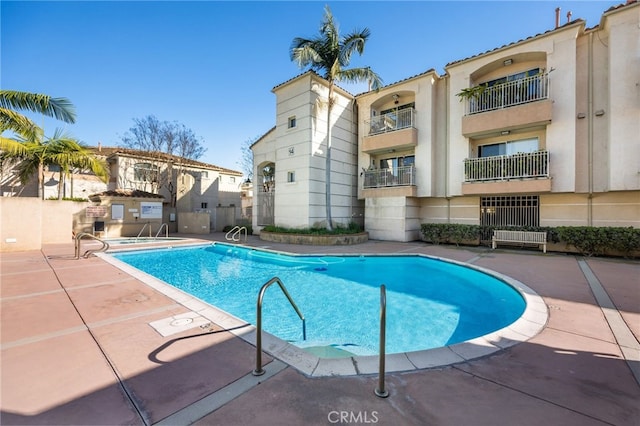 community pool featuring a patio