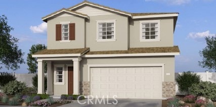 view of front of house featuring stucco siding, an attached garage, concrete driveway, and fence