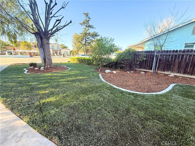 view of yard with fence