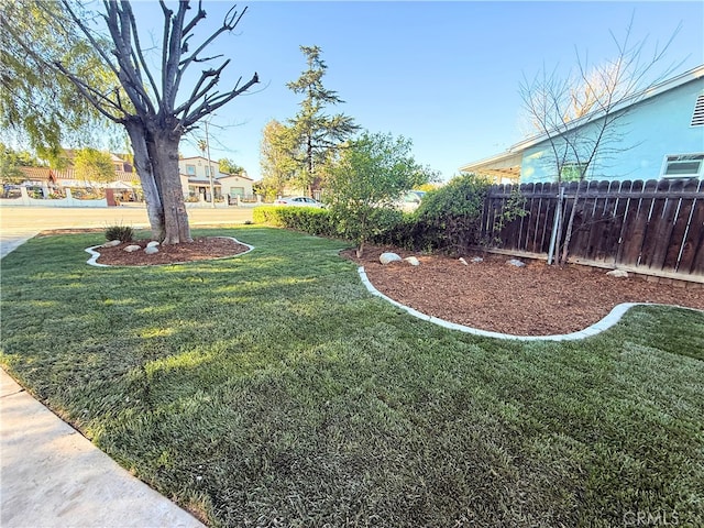 view of yard with fence