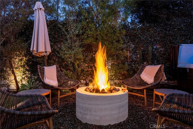 view of patio featuring an outdoor fire pit