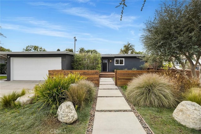 mid-century home featuring stucco siding