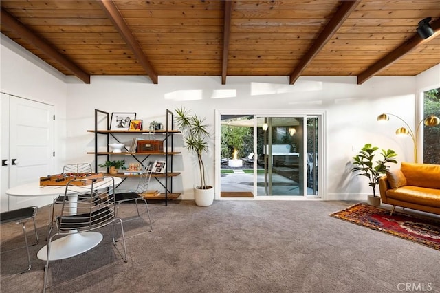 living area featuring carpet flooring, wooden ceiling, lofted ceiling with beams, and baseboards