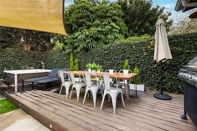 wooden deck with outdoor dining space