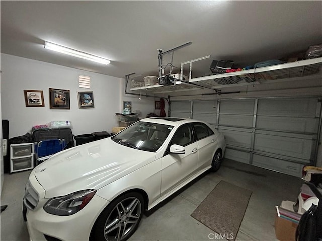 garage featuring a garage door opener