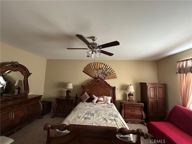 carpeted bedroom with a ceiling fan