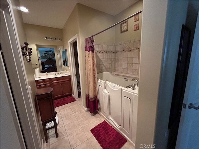 bathroom featuring tile patterned floors and vanity