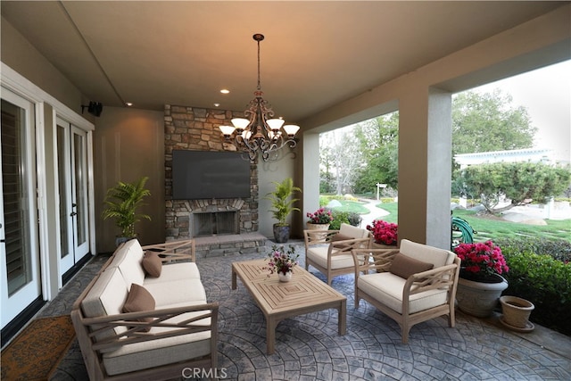 view of patio / terrace featuring an outdoor living space with a fireplace