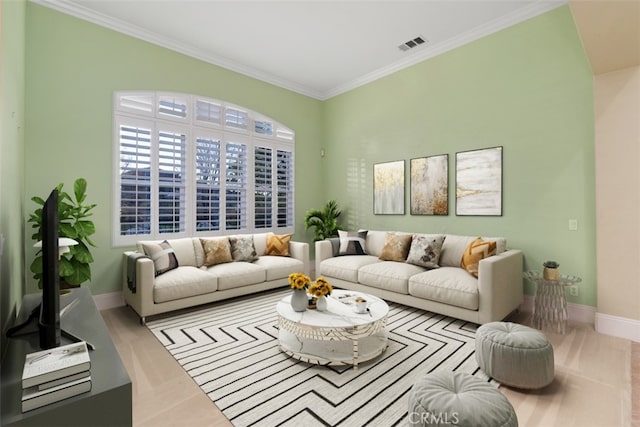 living room with visible vents, baseboards, and ornamental molding