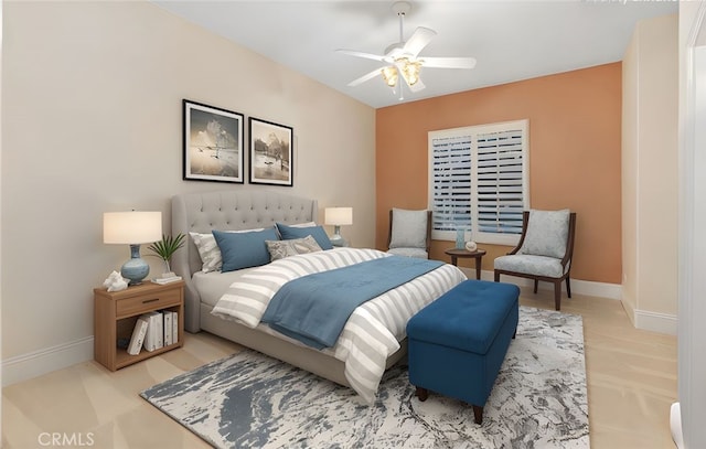 bedroom with a ceiling fan and baseboards