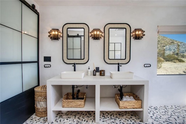 full bathroom featuring a sink