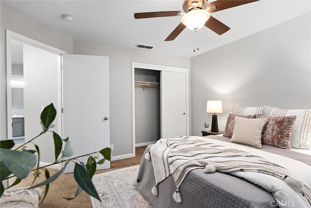 bedroom featuring a ceiling fan, baseboards, visible vents, carpet floors, and a closet