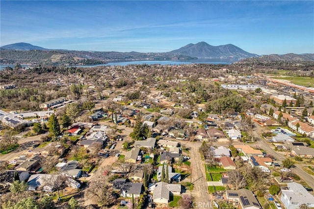 aerial view with a residential view and a water and mountain view