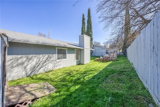 view of yard featuring fence