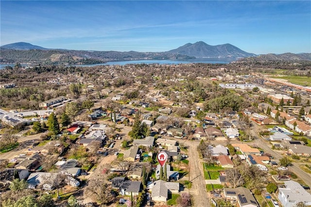 aerial view with a residential view and a water and mountain view