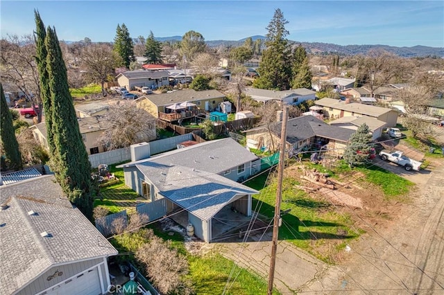 birds eye view of property featuring a mountain view and a residential view