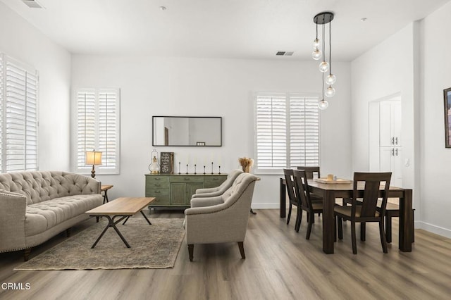 3012 Dunkirk Dr, Oxnard, CA 93035 - living room featuring visible vents, light wood-style flooring, and baseboards