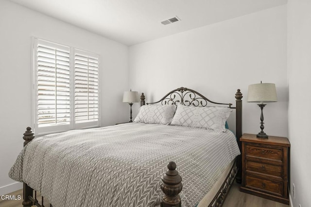 3012 Dunkirk Dr, Oxnard, CA 93035 - bedroom featuring wood finished floors and visible vents