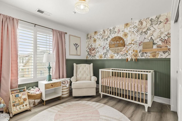3012 Dunkirk Dr, Oxnard, CA 93035 - bedroom featuring wallpapered walls, visible vents, and wainscoting
