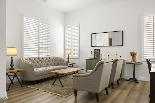 3012 Dunkirk Dr, Oxnard, CA 93035 - living area featuring a wealth of natural light, baseboards, and wood finished floors