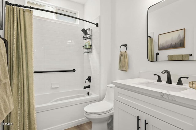 3012 Dunkirk Dr, Oxnard, CA 93035 - full bathroom featuring shower / bath combo with shower curtain, toilet, wood finished floors, and vanity