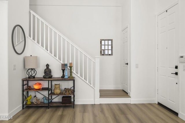 3012 Dunkirk Dr, Oxnard, CA 93035 - entrance foyer with stairway, wood finished floors, and baseboards