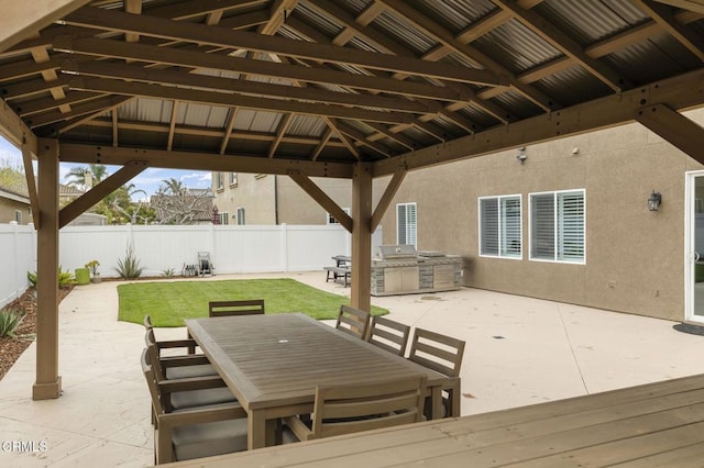 3012 Dunkirk Dr, Oxnard, CA 93035 - view of patio / terrace with a gazebo, exterior kitchen, outdoor dining area, and a fenced backyard
