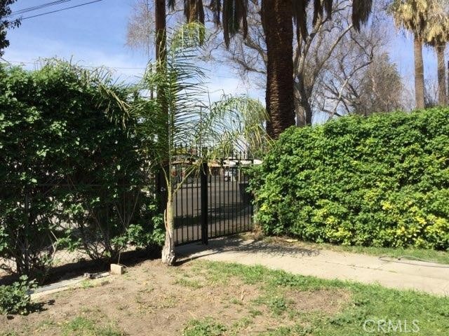view of gate featuring fence
