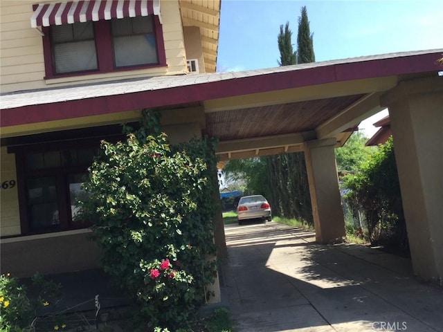 view of parking with driveway