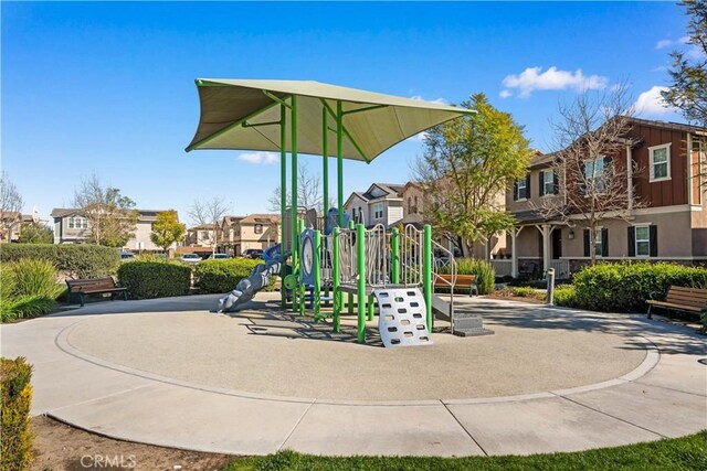 community jungle gym featuring a residential view