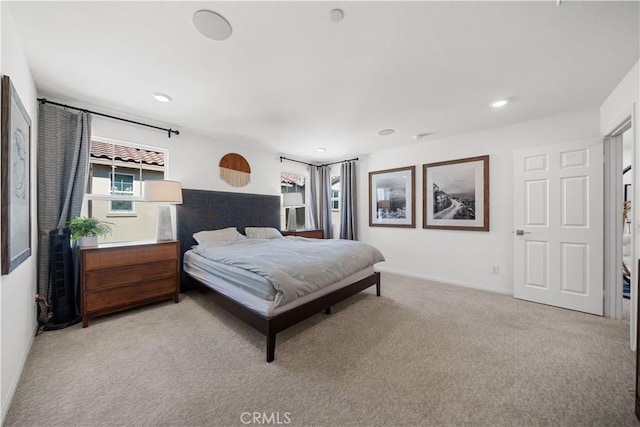 bedroom with carpet flooring, recessed lighting, and baseboards