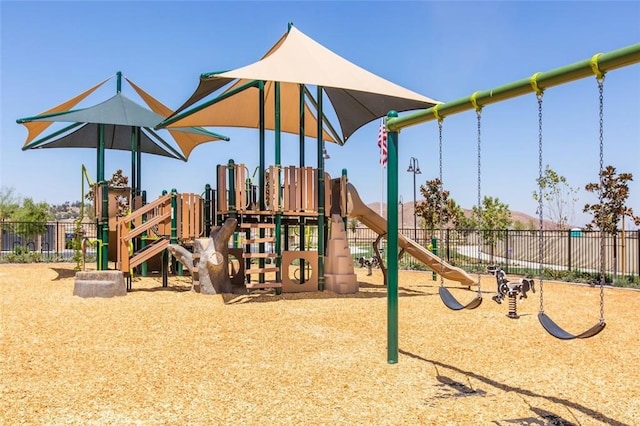 community playground featuring fence