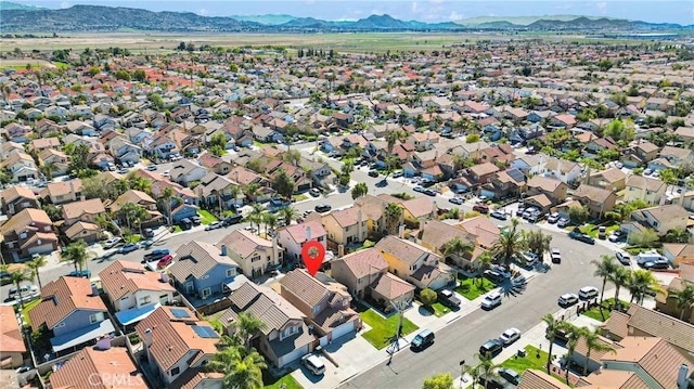 bird's eye view with a mountain view and a residential view