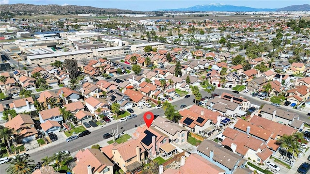 bird's eye view featuring a residential view and a mountain view