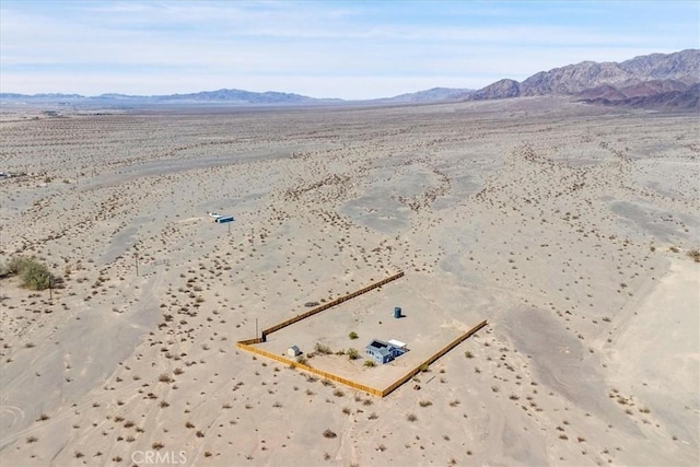 bird's eye view featuring a mountain view and a desert view