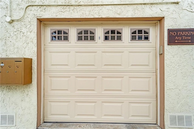 garage with visible vents