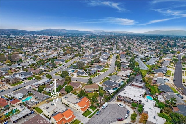 bird's eye view featuring a mountain view and a residential view