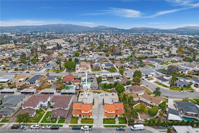 bird's eye view with a mountain view and a residential view