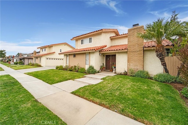 mediterranean / spanish house with stucco siding, a front lawn, a tile roof, a garage, and a chimney